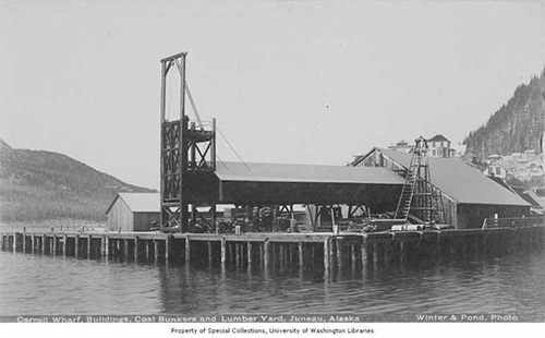 jpg Carroll Wharf showing coal bunkers and lumber yard, Juneau, Alaska, between 1895 and 1905.