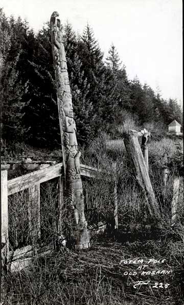 jpg Totem pole and house remains at Old Kasaan