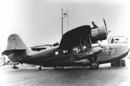 jpg Bud Bodding standing on top of Ellis plane - Date unknown 