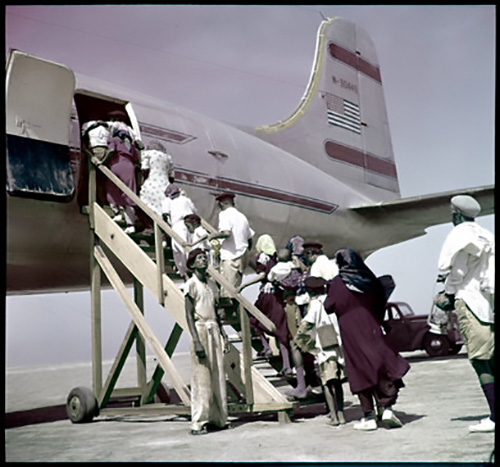 jpg Yemenite Jews board a JDC-chartered Alaska Airlines flight to Israel as part of Operation Magic Carpet.