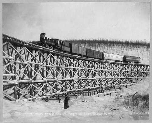 jpg Tanana Valley Railroad crossing a trestle bridge over Fox Gulch in 1916.