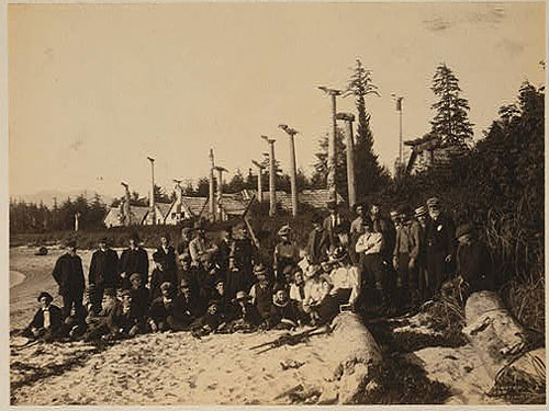 jpg Harriman Alaska Expedition members pose on beach at deserted Cape Fox village, Alaska, 1899