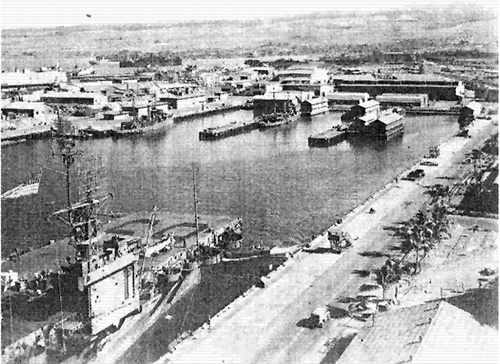 jpg Pearl Harbor: USS Kasaan Bay (CVE-69) in the foreground.