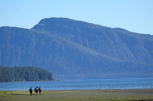 jpg Trevor Fredrickson, Sam Fredrickson and Beebuks Kookesh hike down to the shore on the way to be picked up by a floatplane that would return them home, to Angoon.