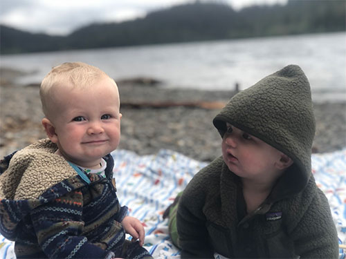 jpg Miles Muse and seven-month-old Theron Dihle on the lake shore.
Photo by MARY CATHARINE MARTIN 