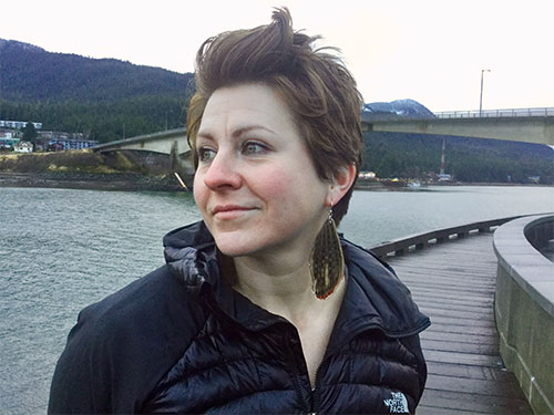 jpg Artist Julienne Pacheco, who makes jewelry out of fish skin and other natural materials, poses on the downtown Juneau Seawalk with earrings made out of arctic grayling dorsal fins. 
