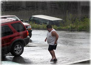 Photo - Surprise Downpour by Carl Thompson